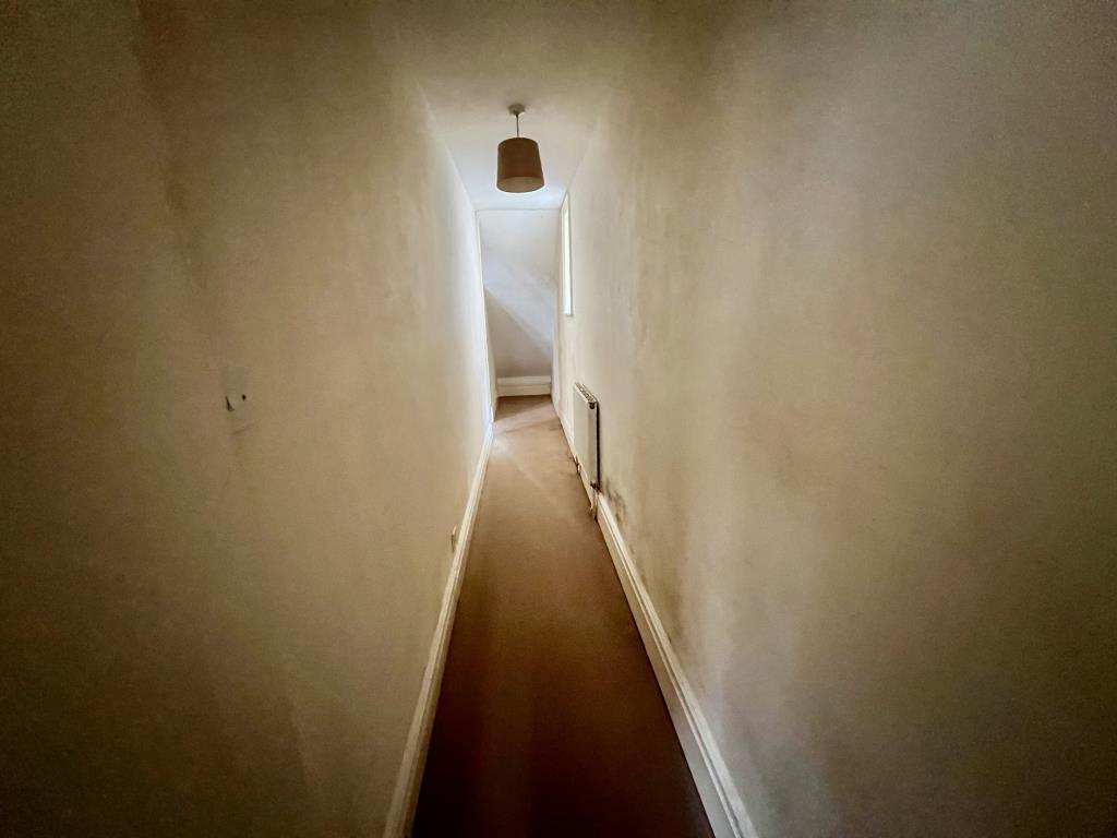 Lot: 102 - TWO-BEDROOM FLAT FOR REFURBISHMENT - View of the hallway within the property
